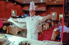 Chef making fresh noodles