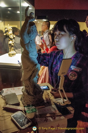 Young sculptor at work