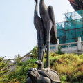 Two celestial cranes standing on a snake and turtle