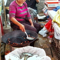 A Chestnut Vendor at the Sandouping Village Market