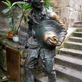 Statue Outside an Old Guildhouse