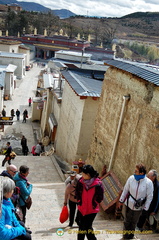 Climbing up to Ganden Sumtseling Monastery