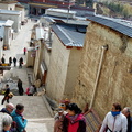 Climbing up to Ganden Sumtseling Monastery