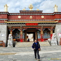 Striding Away from the Ganden Sumtseling Monastery