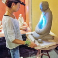 Young sculptor at work