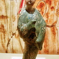 Tri-colour female figure with male garment