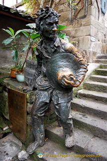 Statue Outside an Old Guildhouse
